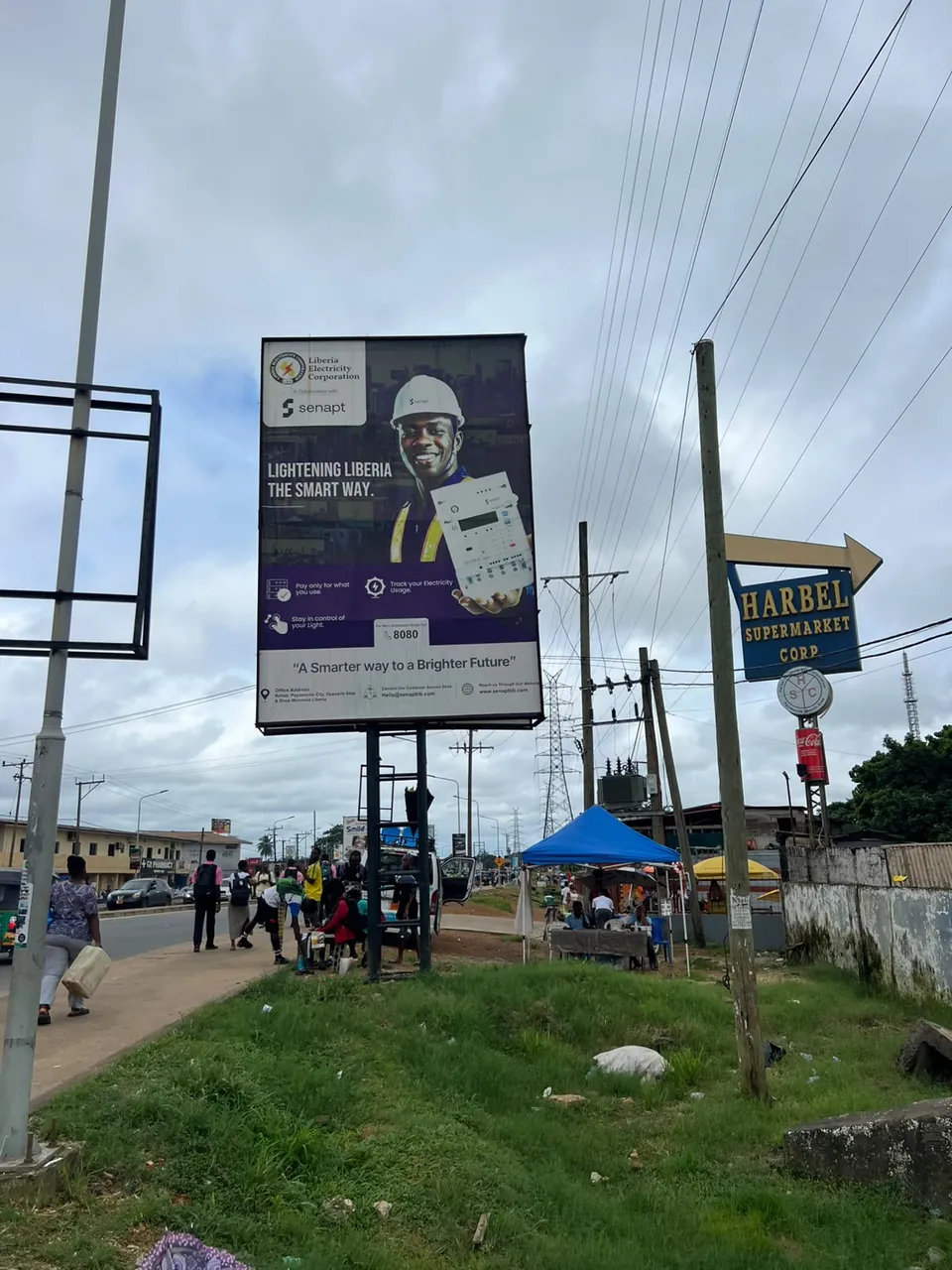 Senapt billboard, ELWA intersection, Paynesville